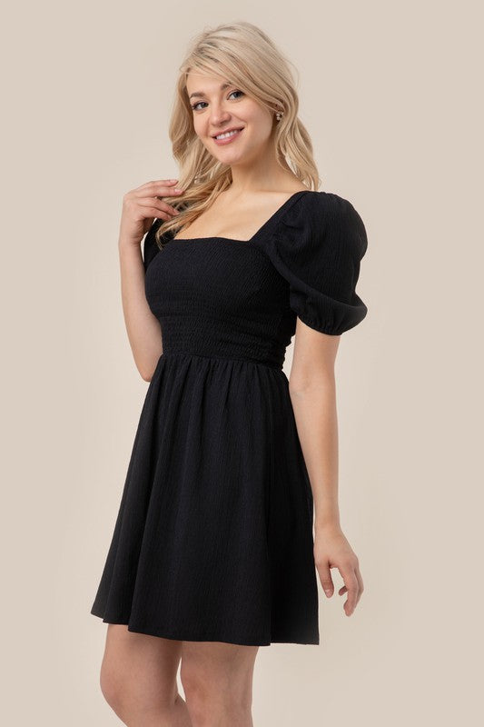Puff sleeved smocked dress - Premium  from Lilou - Just $31.80! Shop now at Alexi and Gray