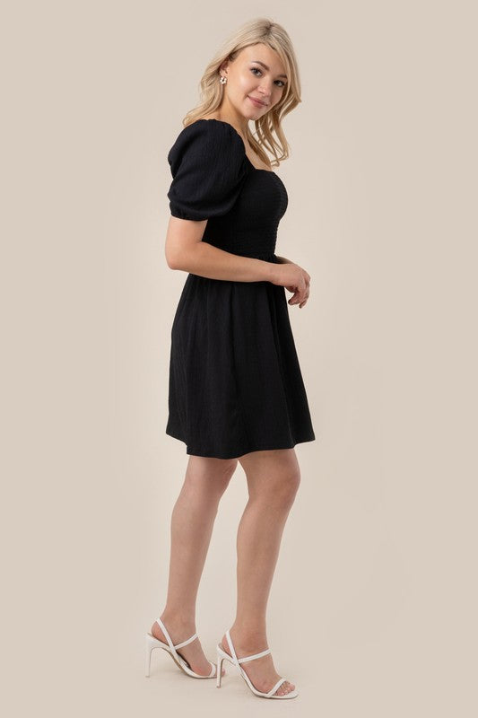 Puff sleeved smocked dress - Premium  from Lilou - Just $23.70! Shop now at Alexi and Gray