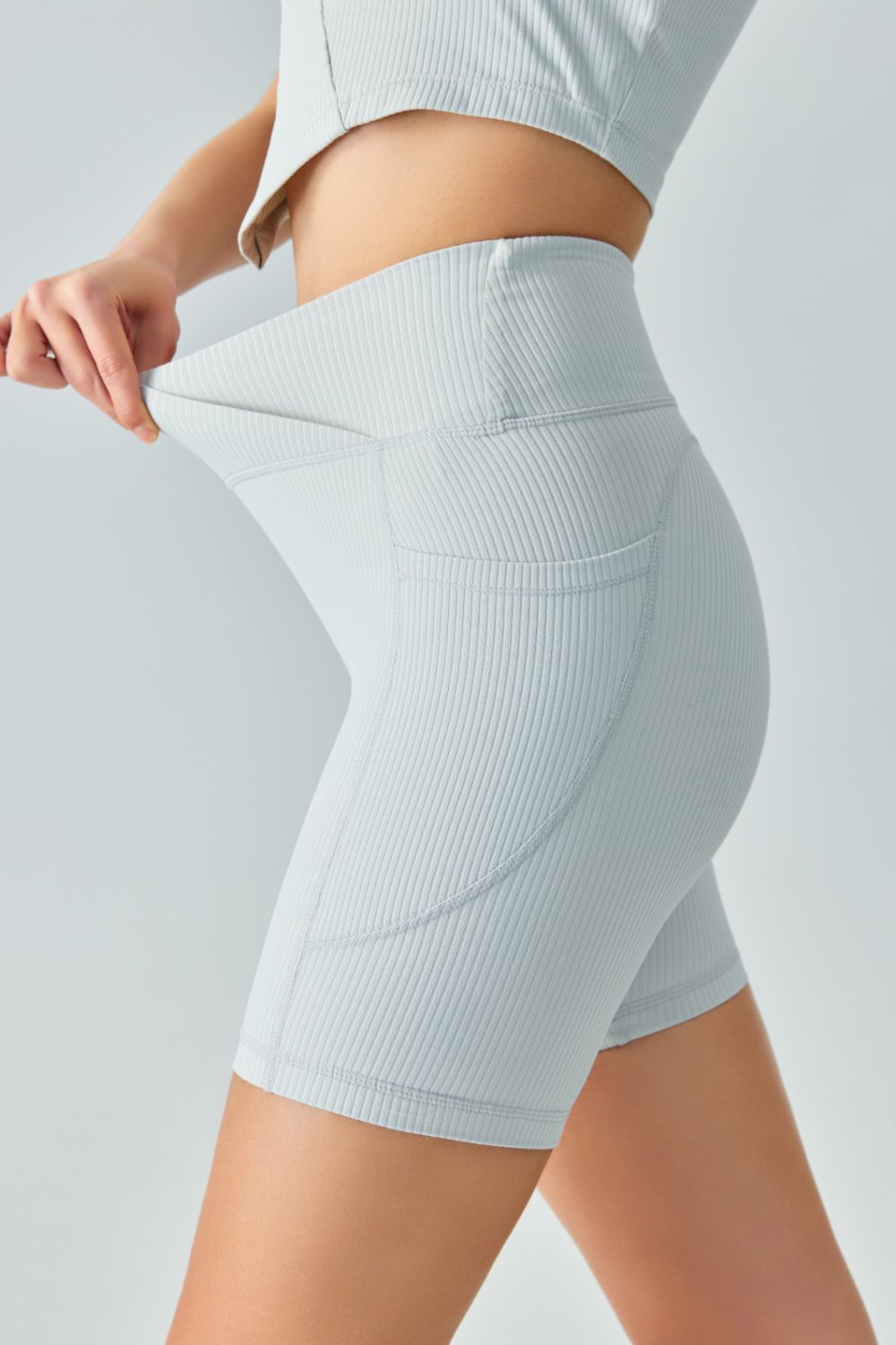 V-Waist Ribbed Sports Biker Shorts with Pockets - Premium  from Trendsi - Just $28.00! Shop now at Alexi and Gray